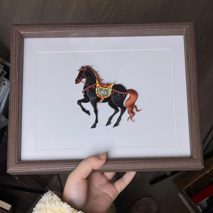 A hand - held handmade Chanhua horse ornament with a black body and orange mane and tail-3