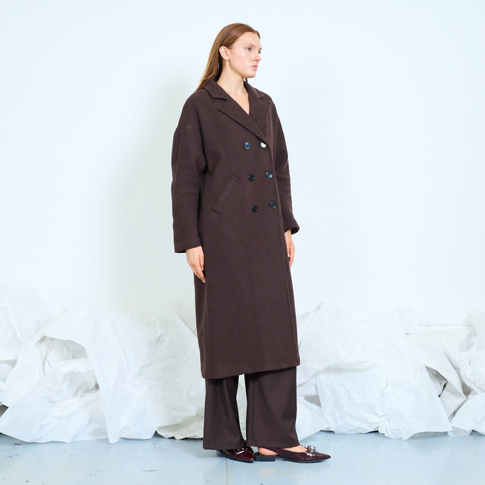 Long double-breasted coat with notched lapels wholesale