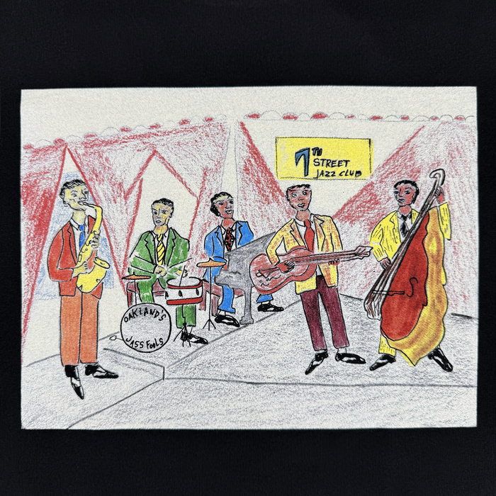 A colorful illustration on the “Ode to Jass Tee” by Other features five jazz musicians in suits playing saxophone, drums, guitar, upright bass, and piano on stage at the “1th Street Jazz Club,” evoking the vibrant spirit of the early jazz scene. Red curtains and spotlights frame the tableau, while the drumhead reads “OAKLAND JASS FOOLS” as a tribute to Oakland’s jazz history.