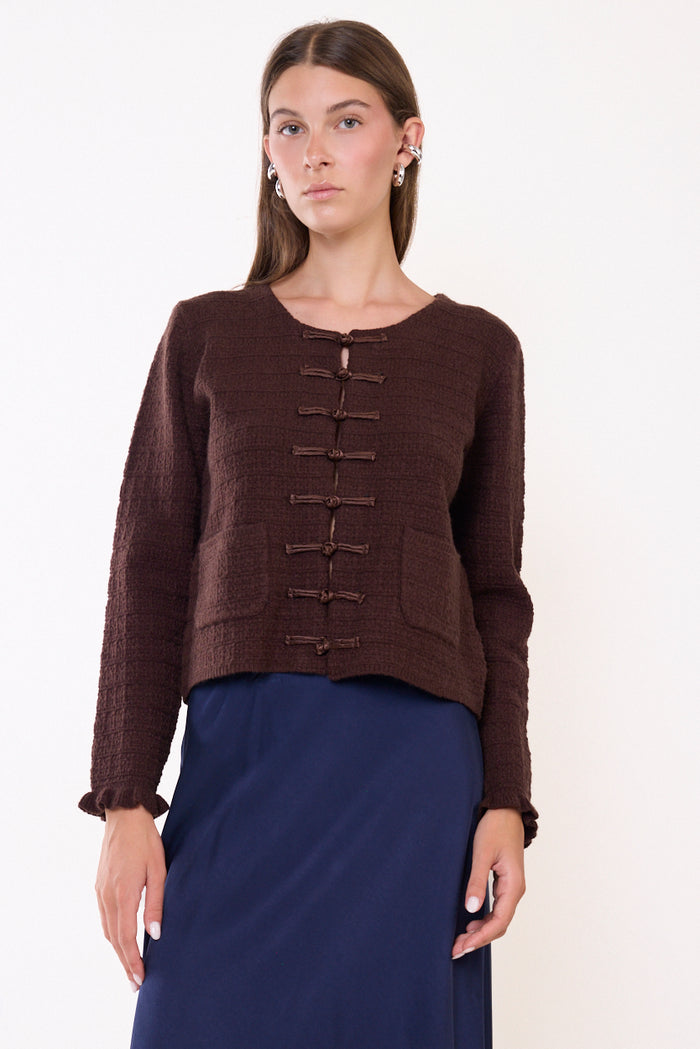 Textured knit cardigan with frog closures and patch pockets wholesale