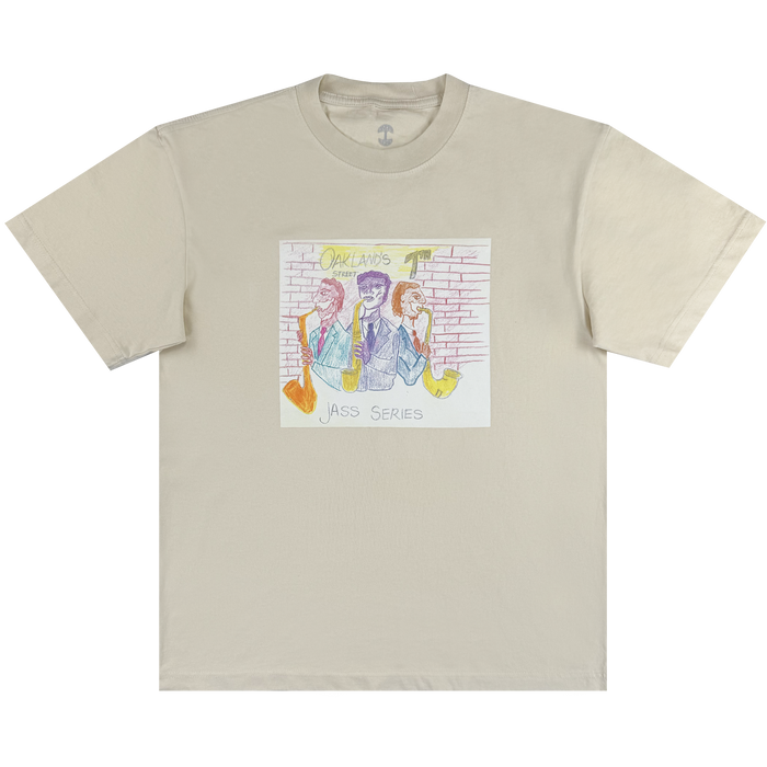 The Other 7th St. Players Tee showcases a hand-drawn, pastel illustration of three hat-wearing figures with saxophones set against a brick wall, capturing the lively Oakland jazz scene on 7th Street. Above the artwork is handwritten text reading “OAKLAND’S,” while “JASS SERIES” appears below.