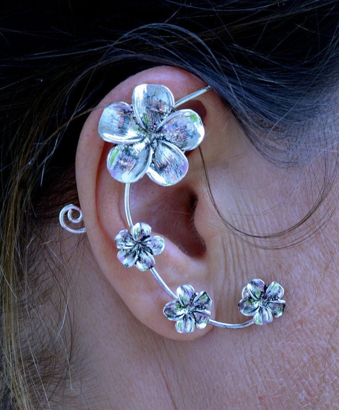 silver plumeria flower elf ear cuff earrings non piercing floral ear wrap jewelry worn on ear close up
