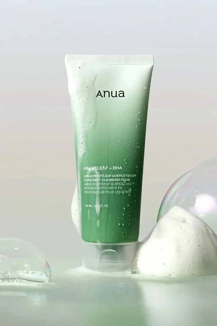Artistic shot of Anua cleansing foam with dense bubbles, highlighting its refreshing feel as a cleanser for oily skin.