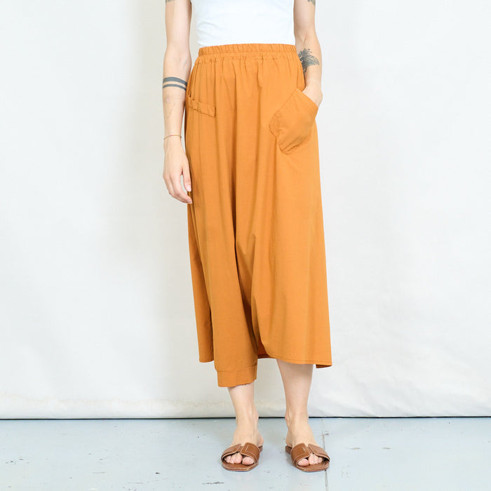 Asymmetric pocket midi skirt wholesale