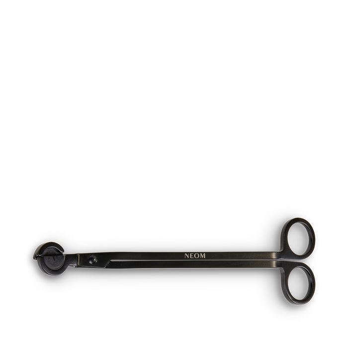 Black Wick Trimmer with 'NEOM' branding on a white background