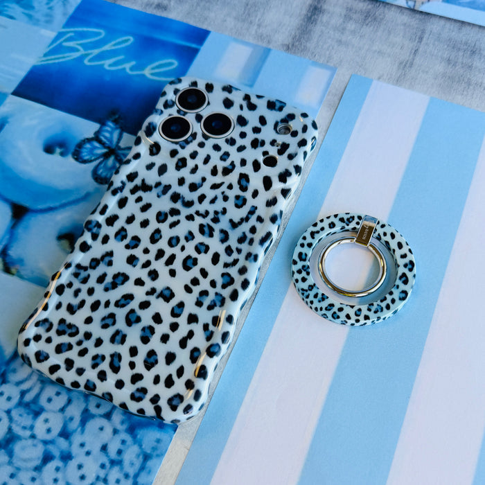 Blue Ice Leopard pattern MagSafe phone grip ring with black and teal leopard spots on a light blue background compatible with iPhone and Samsung