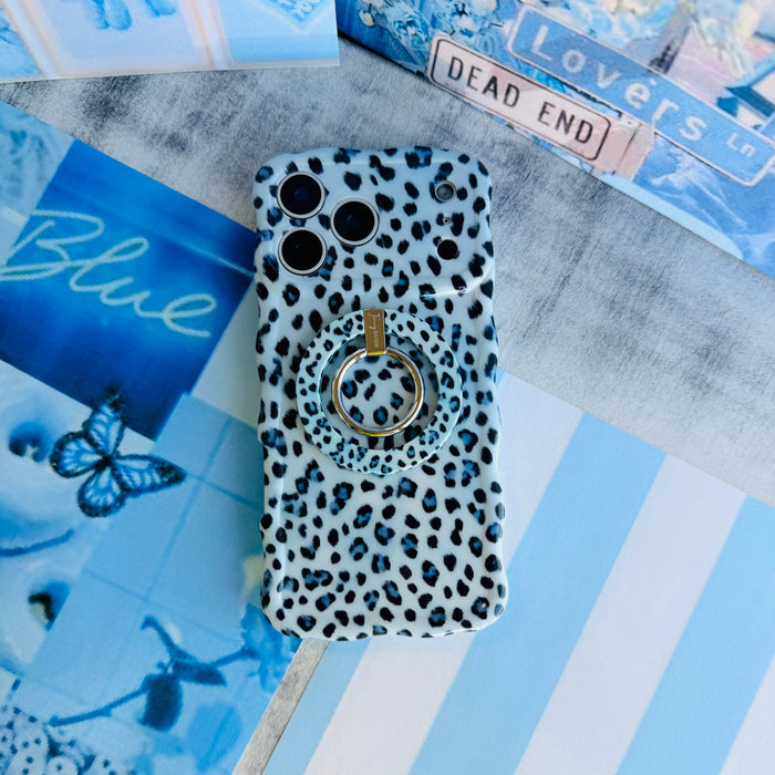 Blue Ice Leopard pattern MagSafe phone grip ring with black and teal leopard spots on a light blue background compatible with iPhone and Samsung