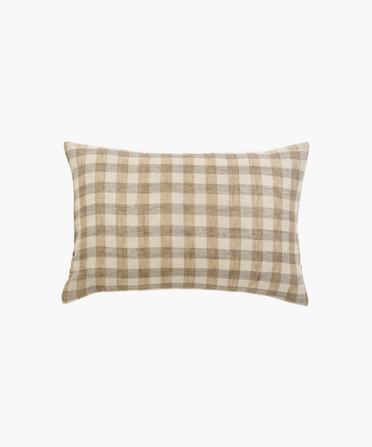 A rectangular pillow with a beige and brown checkered pattern. The design is simple and rustic, conveying a cozy and inviting atmosphere. | Wildwood Home Co.