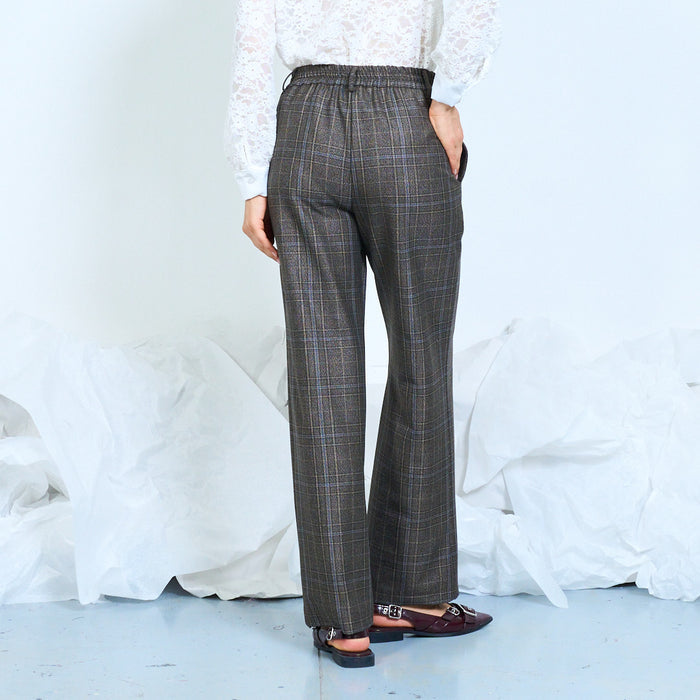 Checked wide-leg trousers with front button fastening wholesale