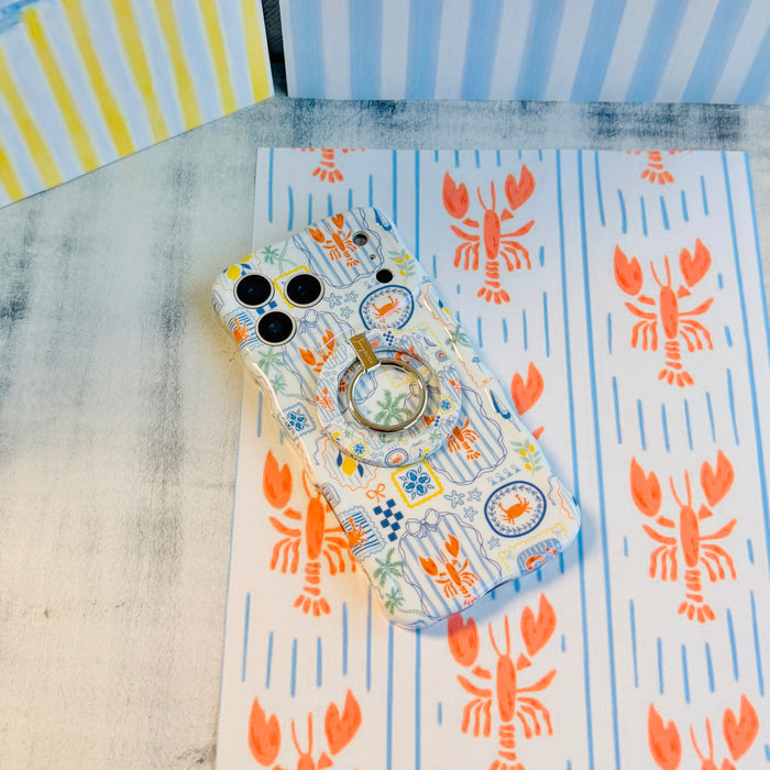 Coastal Catch MagSafe phone grip ring with orange lobster, blue stripes, and nautical postage stamp pattern compatible with iPhone and Samsung