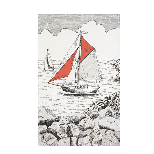 A black and white tea towel with an illustration of a sailboat with a red sail on it.