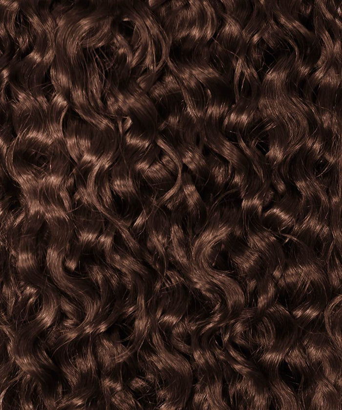 Close-up of shiny, healthy, well-defined chocolate brown spiral curls styled with Perfect Locks Curly Classic Clip-In Hair Extensions.#color_chocolate-brown-(3)