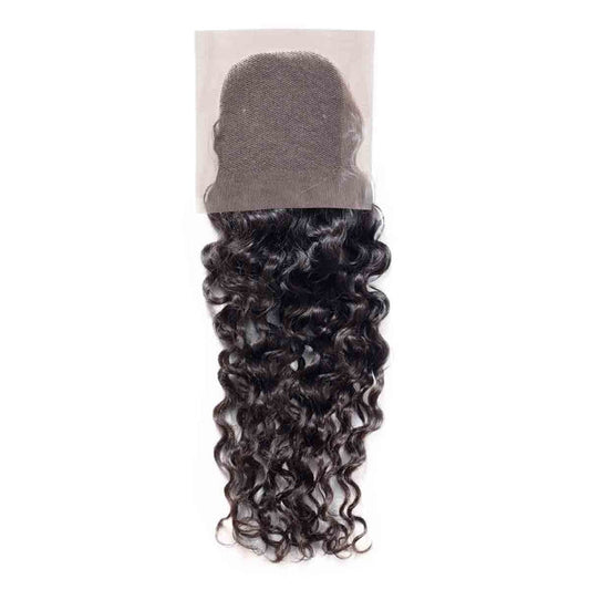 A curly black hair lace closure piece with defined waves on a white background. The lace base shows at the top with soft curls below.
