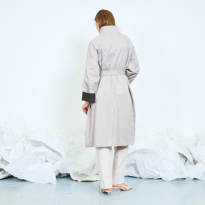 Draped belted trench coat with asymmetric front wholesale