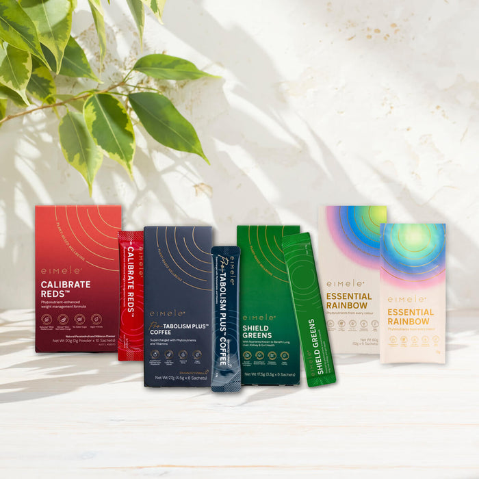 Collection of health and wellness sachets on a light background with leaves.