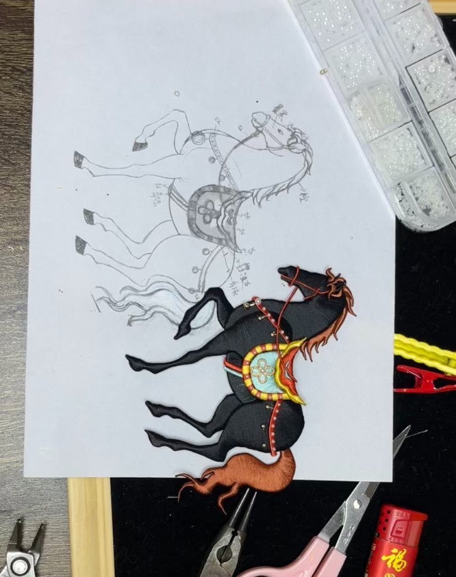 A hand - held handmade Chanhua horse ornament with a black body and orange mane and tail-2