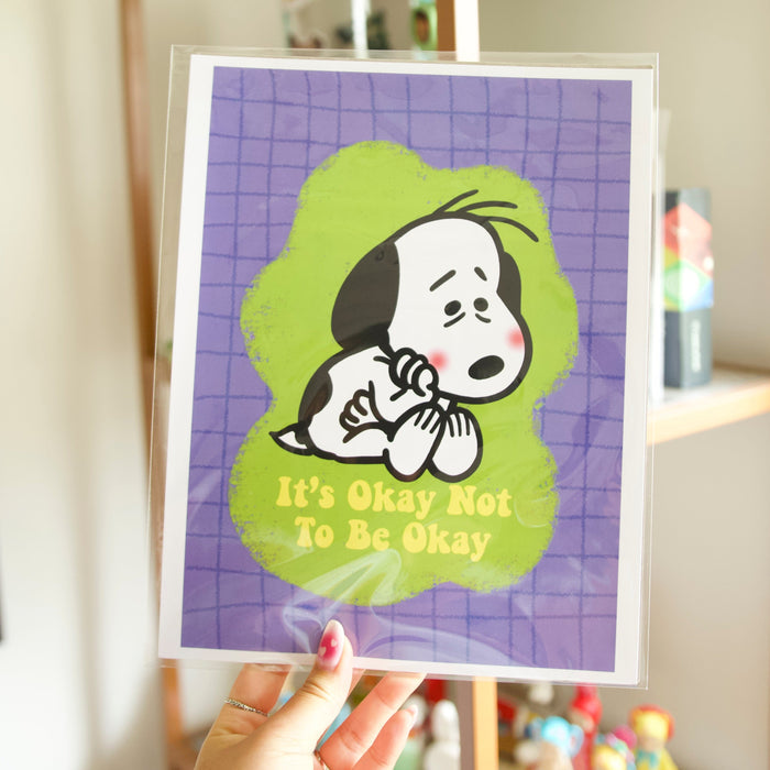 Framed poster with a sad snoopy