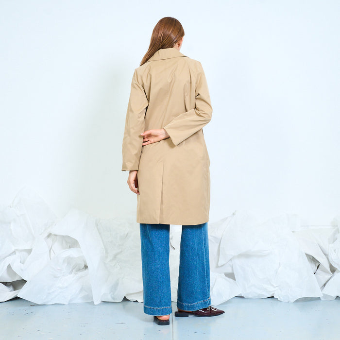 Long button-front trench coat with welt pockets wholesale