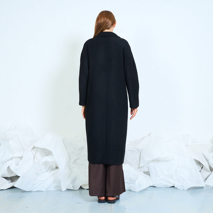 Long double-breasted coat with notched lapels wholesale