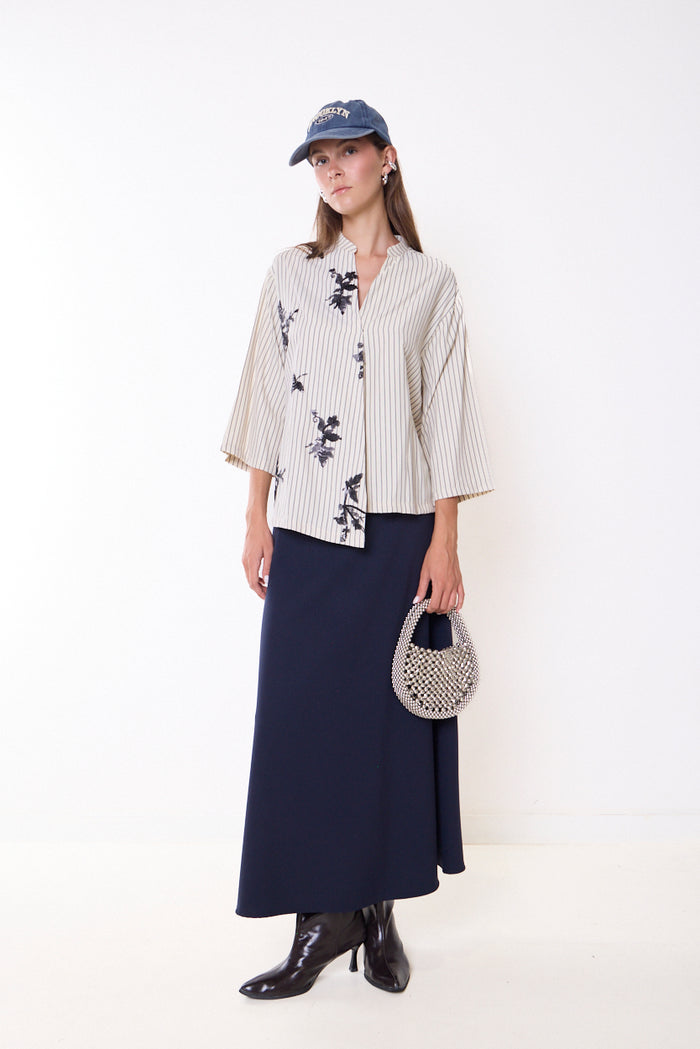 Long flowing skirt with curved waistband and scalloped hem wholesale