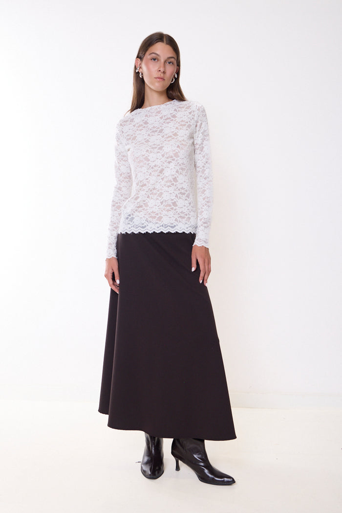 Long flowing skirt with curved waistband and scalloped hem wholesale