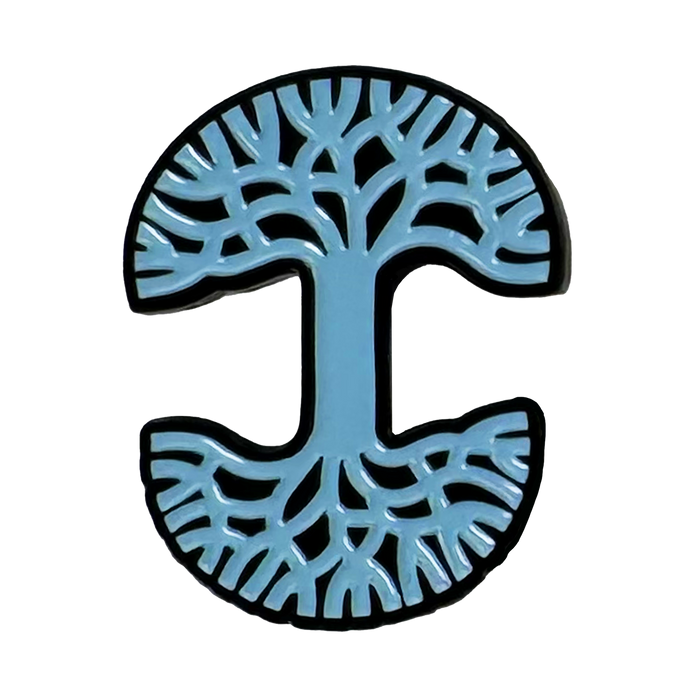 The Oaklandish Logo Enamel Pin by Oaklandish features a stylized blue tree shaped like a capital "I," with mirrored branches and a thick trunk, outlined in black on white—making it the perfect accessory.