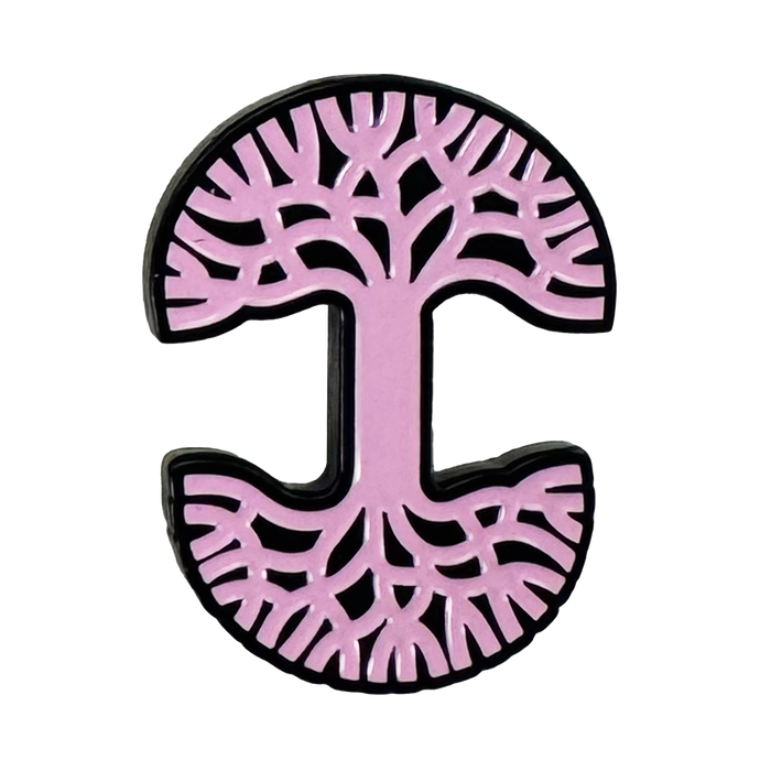 The Oaklandish Logo Enamel Pin by Oaklandish features a bold, curved, capital “I” shape in light pink with black outlines. Its top half forms tree branches and the bottom roots, both with cutout patterns on a white background.
