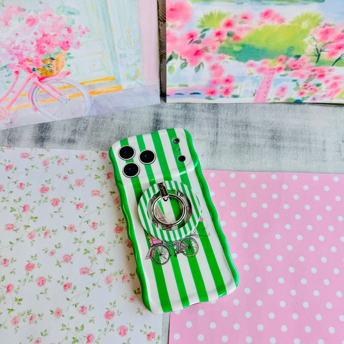 Trendy wavy iPhone case featuring green and white vertical stripes with a central Eiffel Tower and bicycle graphic.
