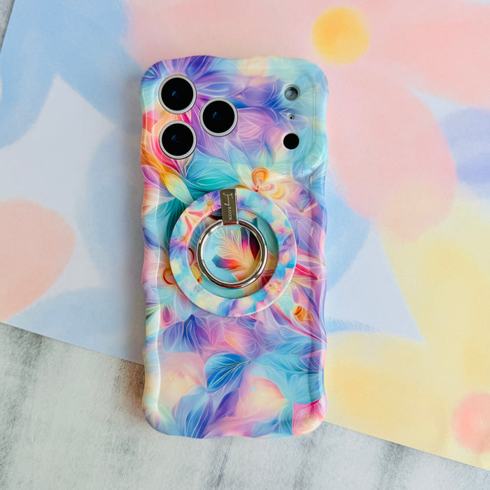 Pastel Paradise iridescent floral MagSafe phone grip ring with glowing lavender blue and coral petals compatible with iPhone and Samsung