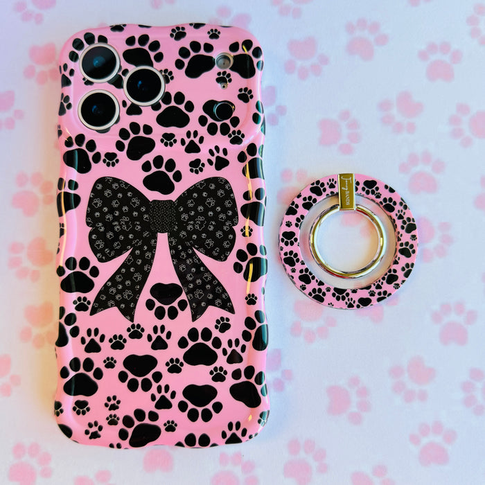 Pretty Little Paws pattern MagSafe phone grip ring with black paw prints on a pink background compatible with iPhone and Samsung