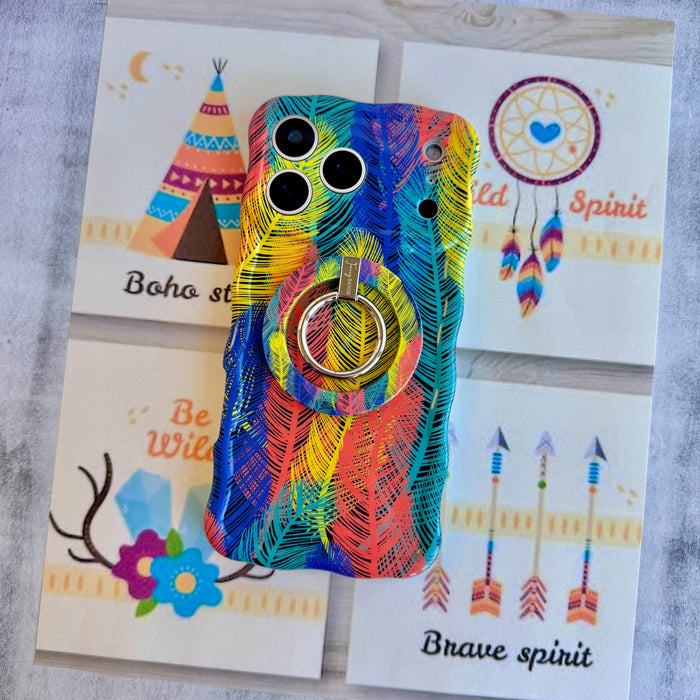 Rainbow Feather Muse pattern MagSafe phone grip ring with vibrant overlapping yellow coral and navy feathers compatible with iPhone and Samsung