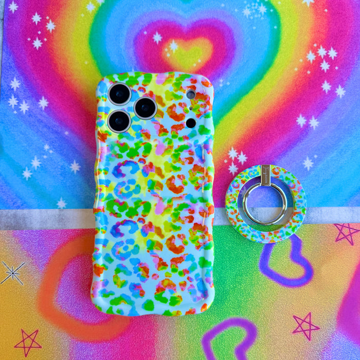 Rainbow Roar Leopard MagSafe phone grip ring with neon multi-colored animal print spots on a mint background compatible with iPhone and Samsung