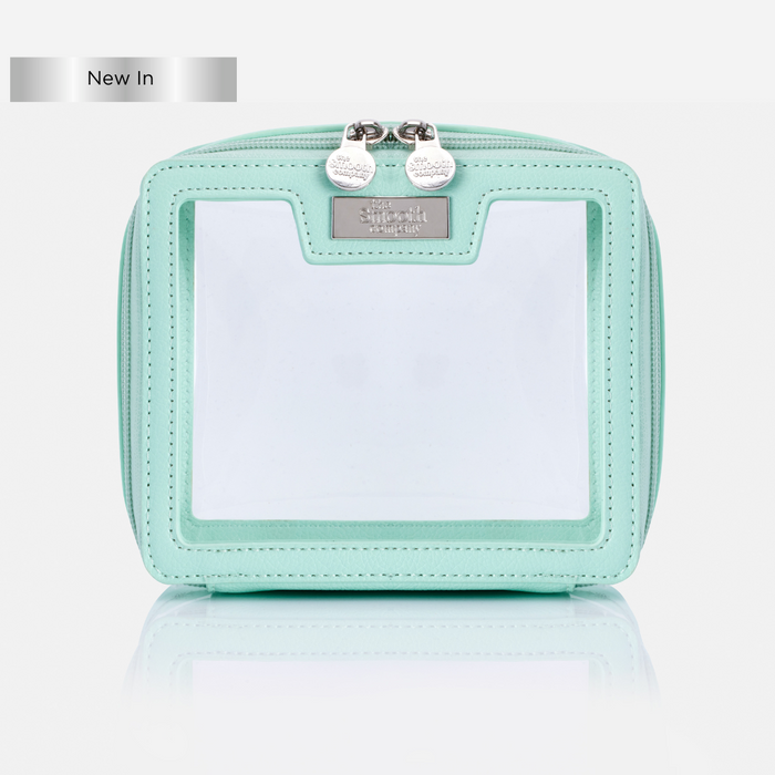 A green travel bag with transparent PVC panels and silver zips, displayed against a white background.