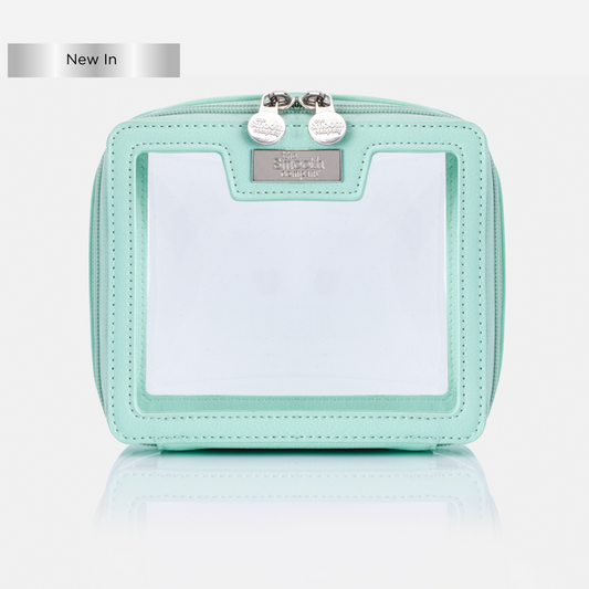 A green travel bag with transparent PVC panels and silver zips, displayed against a white background.