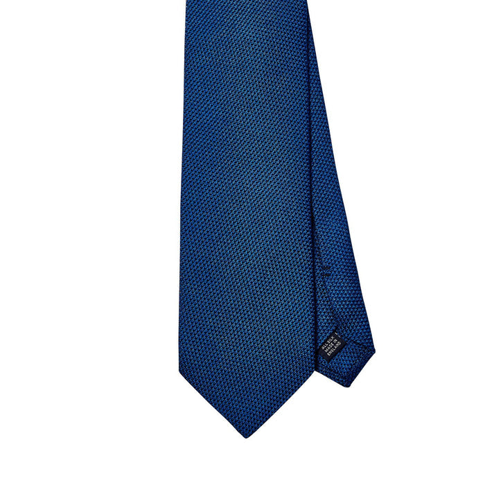 Handmade KirbyAllison.com Sovereign Grade Grenadine Fina Bright Blue Tie in the United Kingdom, featuring a blue tie on a white background.