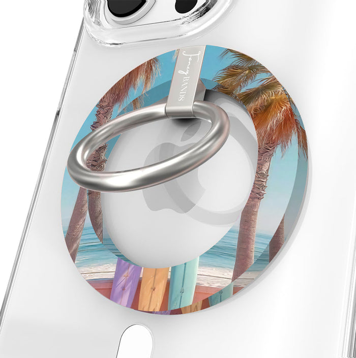 Sweet Summer MagSafe phone grip ring featuring surfboards leaning against palm trees on a tropical beach with ocean waves and a blue sky