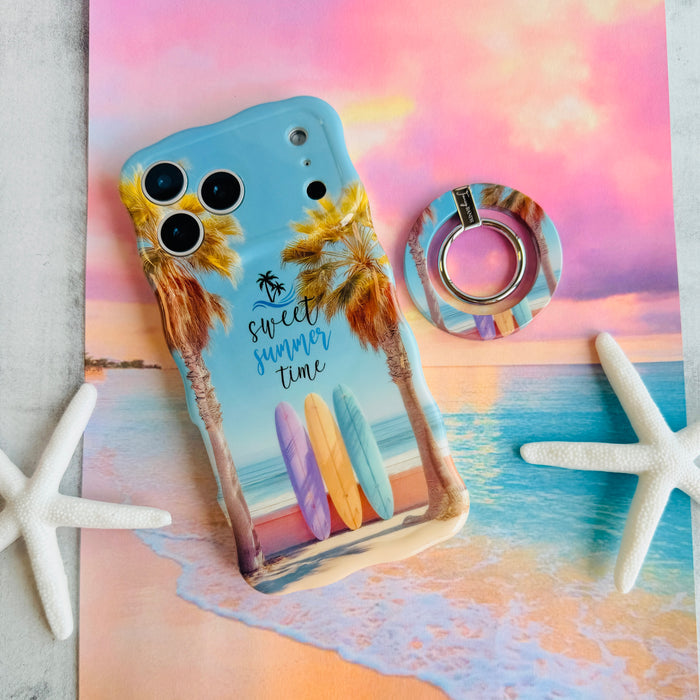 Sweet Summer MagSafe phone grip ring featuring surfboards leaning against palm trees on a tropical beach with ocean waves and a blue sky