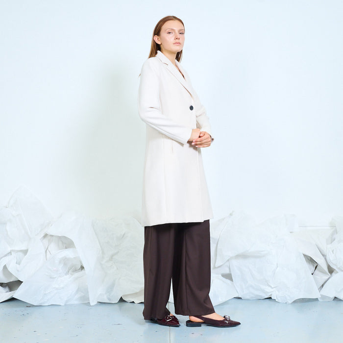 Tailored single-breasted coat with welt pockets wholesale