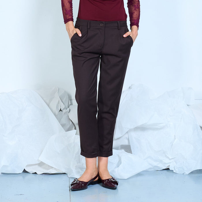 Tapered trousers with cuffed hems and side pockets wholesale