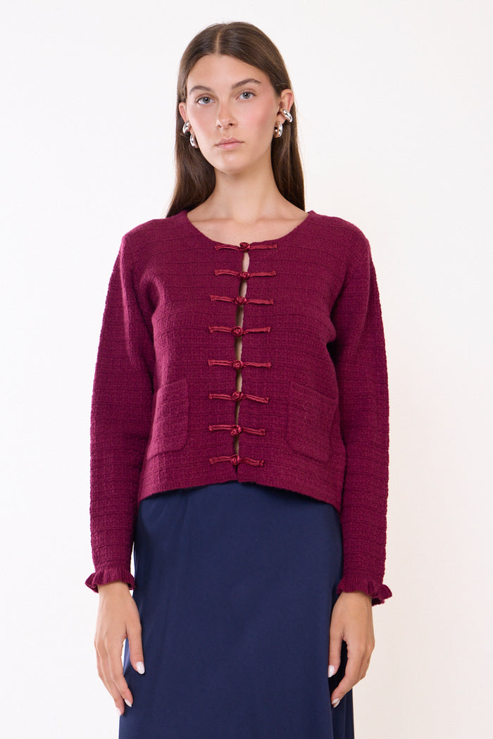 Textured knit cardigan with frog closures and patch pockets wholesale