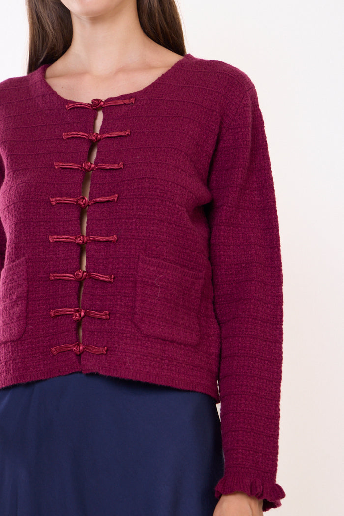 Textured knit cardigan with frog closures and patch pockets wholesale