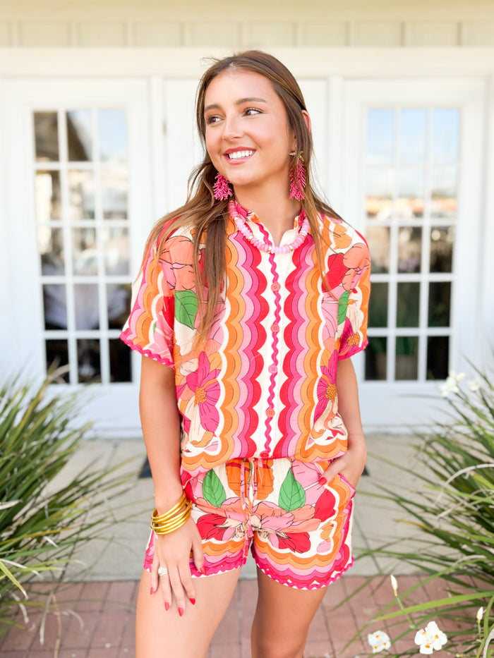 short sleeve button down top and matching shorts