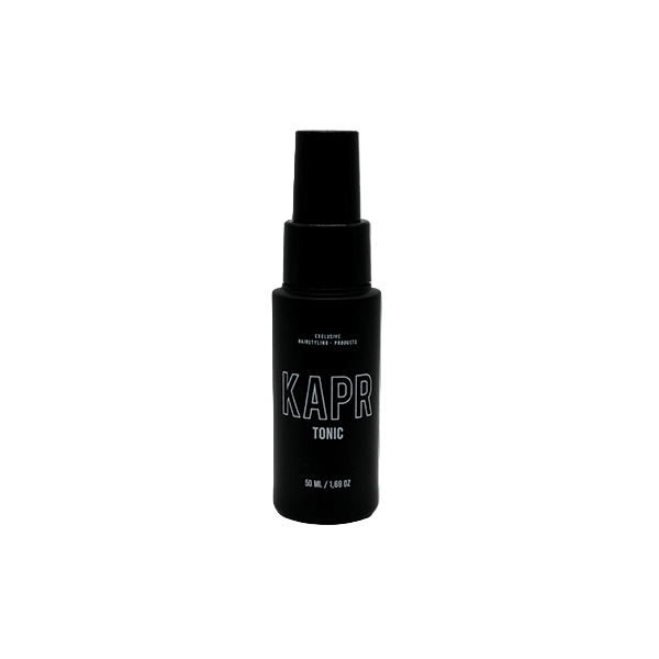 KAPR Tonic – zwarte fles met wit logo op transparante achtergrond, verfrissende haarverzorging.