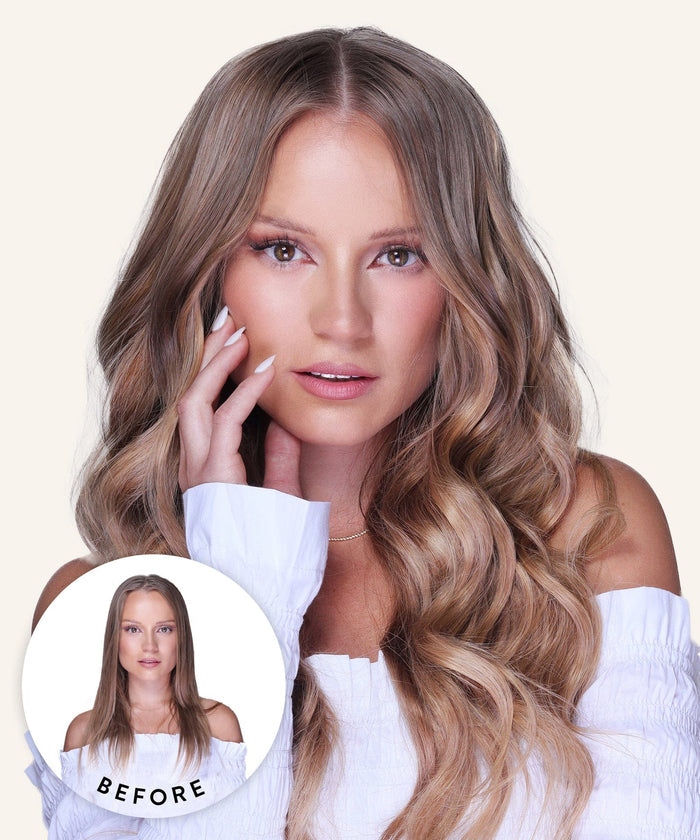 A woman with voluminous wavy natural black hair styled with clip-in extensions poses in a white off-shoulder top; inset shows her straight, flat hair and neutral expression.