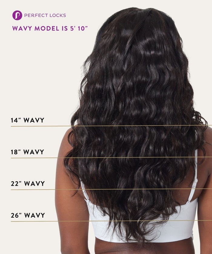 A woman with long, wavy dark hair is shown from the back in a white bra, modeling Perfect Locks Wavy extensions. Text: Model is 5’10.